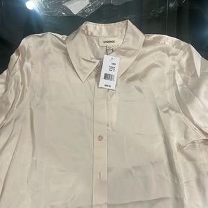L’agence Dani blouse in champagne. Size Medium. NWT